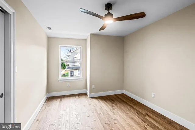 a bathroom with a shower and a toilet
