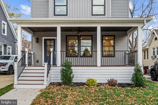 a view of a house with a flower garden