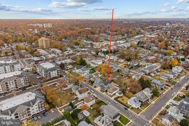 an aerial view of residential building with parking space