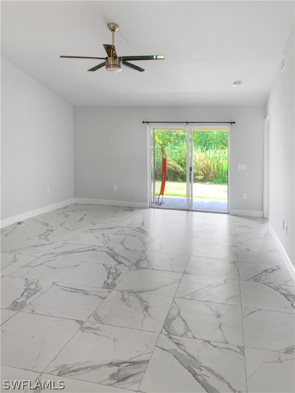 7418 Albany Road, Unit 7418 Fort Myers, FL 33967 - Photo 5 of 11 a view of an empty room with a window