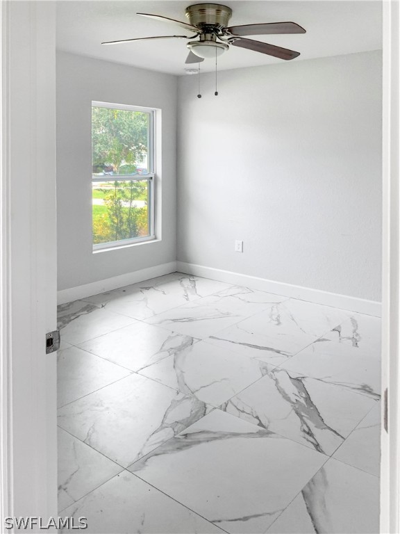 7418 Albany Road, Unit 7418 Fort Myers, FL 33967 - Photo 6 of 11 view of an empty room with a window