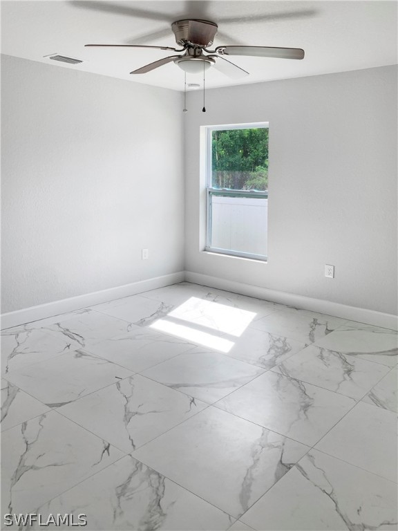 7418 Albany Road, Unit 7418 Fort Myers, FL 33967 - Photo 8 of 11 a view of a window in an empty room