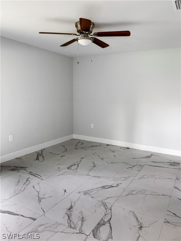 7418 Albany Road, Unit 7418 Fort Myers, FL 33967 - Photo 9 of 11 a view of a room with an empty space