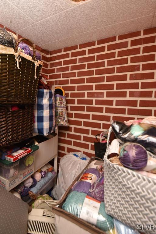 790 Briarstone Road Bethlehem, PA 18017 - Photo 23 of 40 Brick faced wine storage room in basement