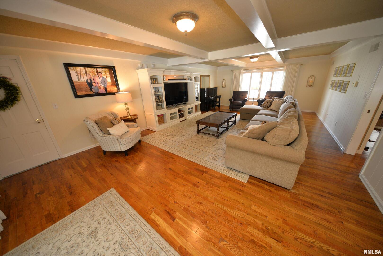 616 Seville Drive Mount Vernon, IL 62864 - Photo 31 of 62 a living room with furniture and wooden floor