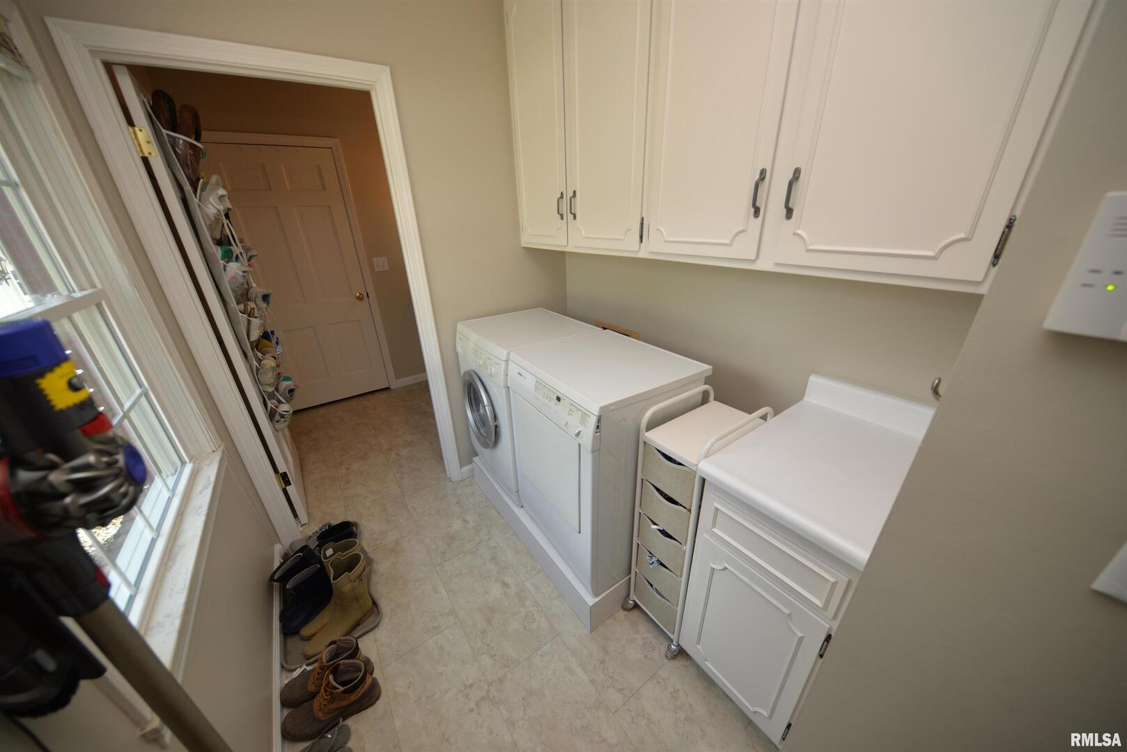 616 Seville Drive Mount Vernon, IL 62864 - Photo 36 of 62 a utility room with dryer and washer