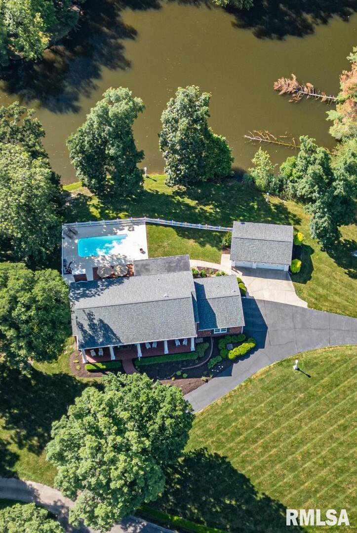 616 Seville Drive Mount Vernon, IL 62864 - Photo 4 of 62 an aerial view of a house having swimming pool and a yard