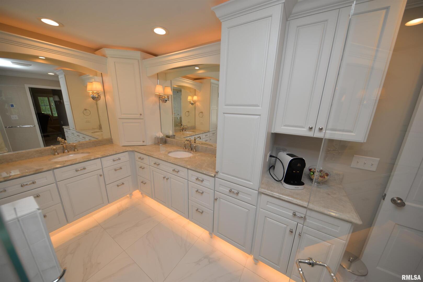 616 Seville Drive Mount Vernon, IL 62864 - Photo 46 of 62 a spacious bathroom with a sink and a mirror