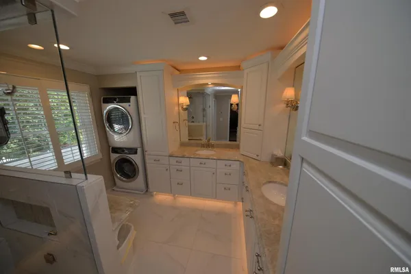 a view of a living room with wooden floor
