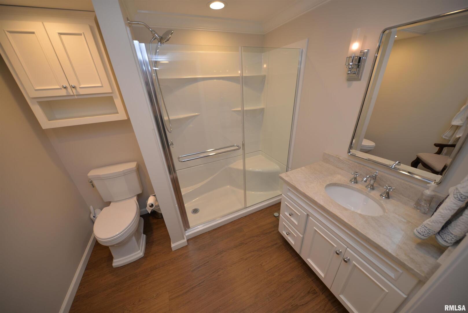 616 Seville Drive Mount Vernon, IL 62864 - Photo 61 of 62 a bathroom with a sink toilet and shower