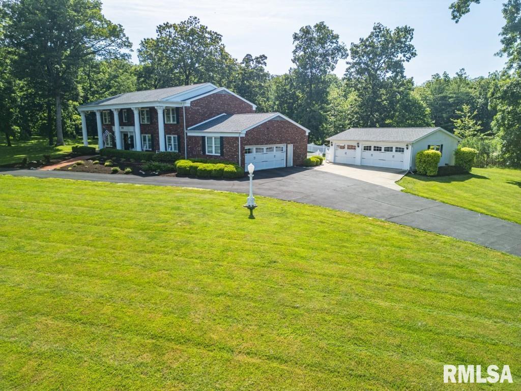 616 Seville Drive Mount Vernon, IL 62864 - Photo 8 of 62 a front view of house with yard and swimming pool
