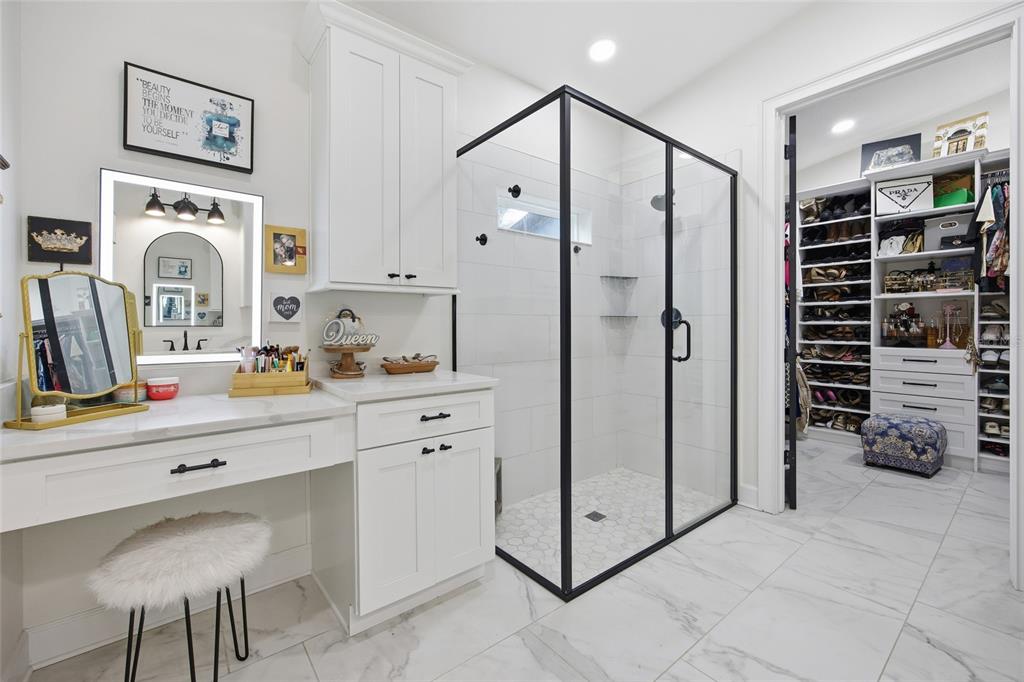 12052 Southeast 101st Court Road Belleview, FL 34420 - Photo 23 of 74 a kitchen with a refrigerator and cabinets