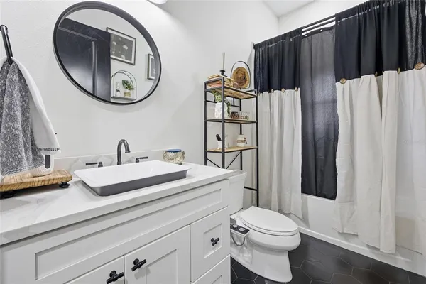 a view of a hallway with a door