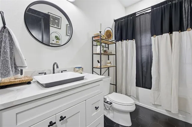 a view of a hallway with a door