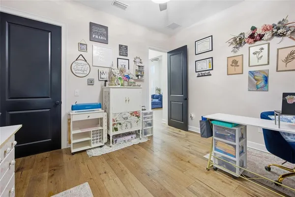 a view of a house with a yard and garage