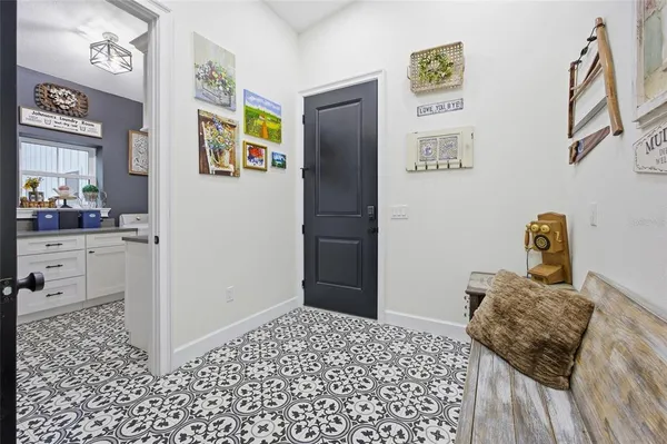 an aerial view of residential house with outdoor space and swimming pool