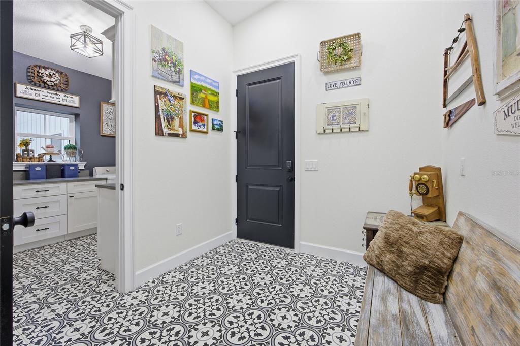 12052 Southeast 101st Court Road Belleview, FL 34420 - Photo 37 of 74 a bedroom with a bed and cabinets