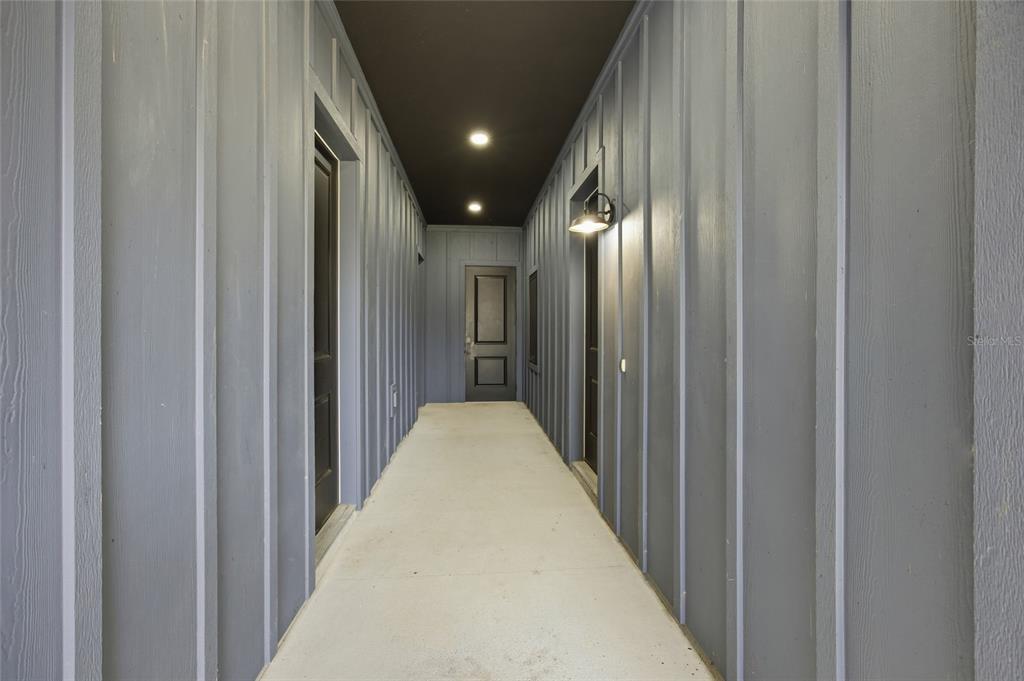 12052 Southeast 101st Court Road Belleview, FL 34420 - Photo 56 of 74 a view of a hallway with a door