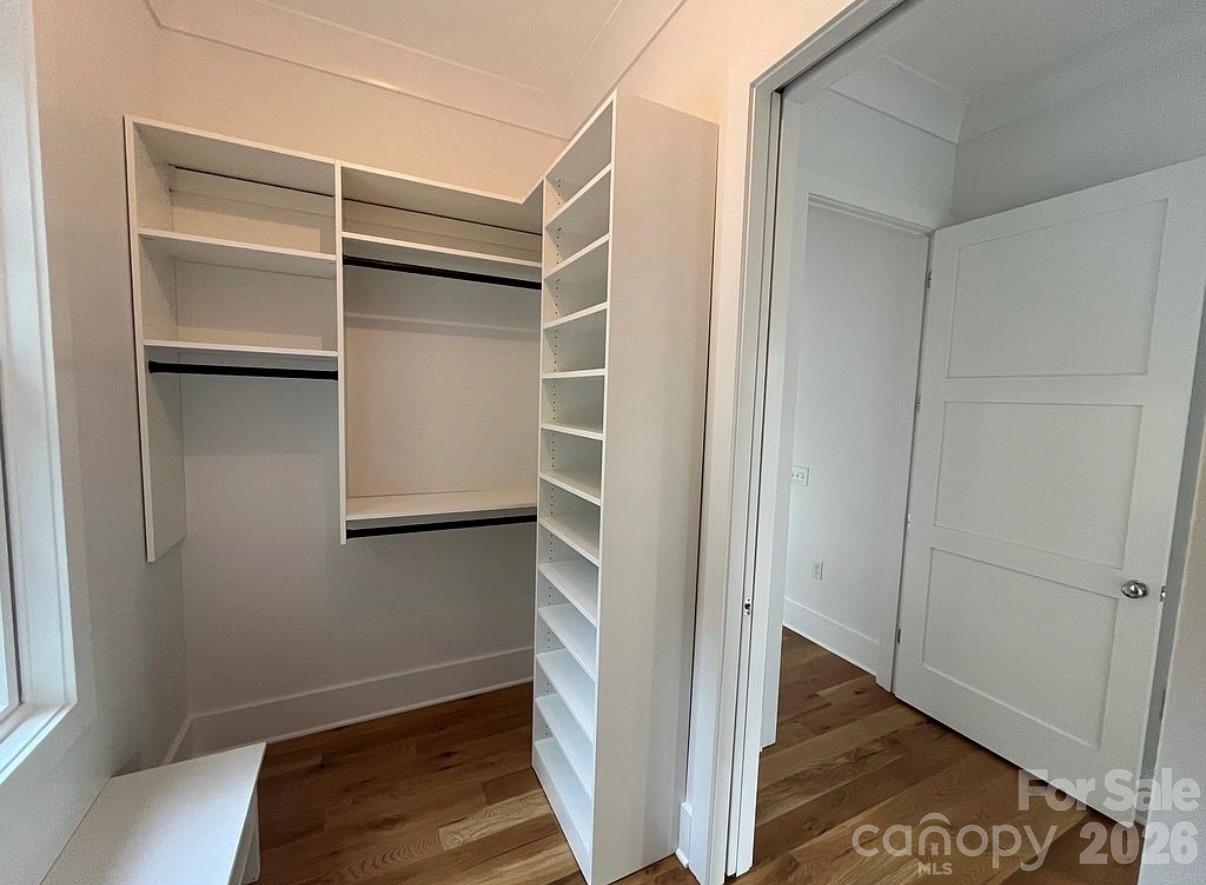 3434 Old Jonas Ridge Road Newland, NC 28657 - Photo 27 of 46 a view of walk in closet with empty racks