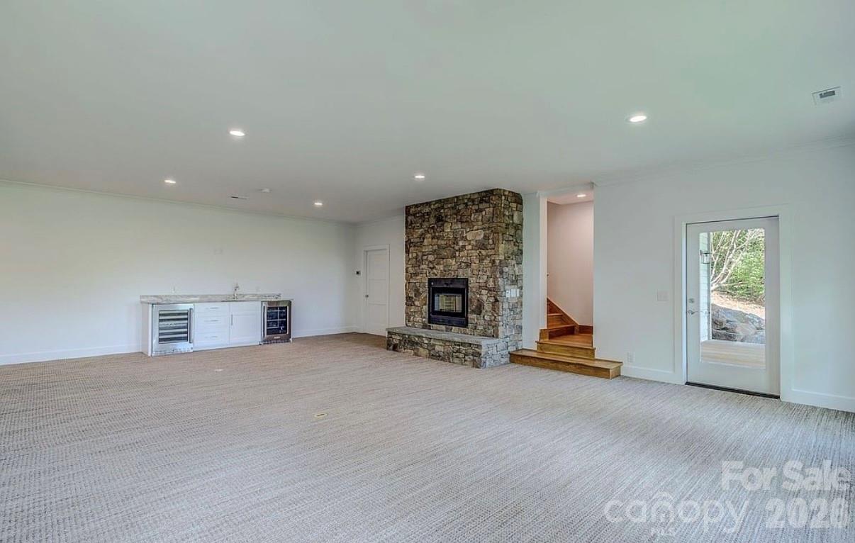 3434 Old Jonas Ridge Road Newland, NC 28657 - Photo 36 of 46 a view of a livingroom with a furniture and a fireplace