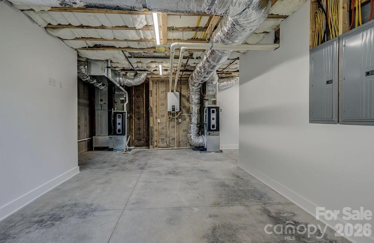 3434 Old Jonas Ridge Road Newland, NC 28657 - Photo 40 of 46 a view of a room with wooden walls