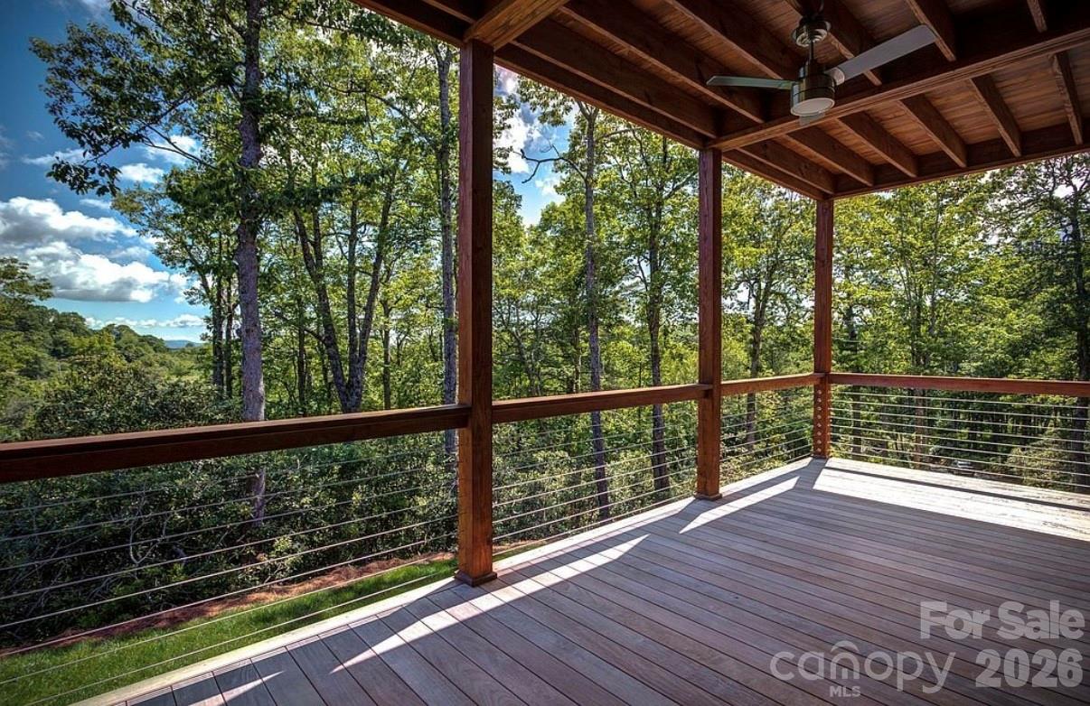 3434 Old Jonas Ridge Road Newland, NC 28657 - Photo 41 of 46 a view of a balcony with wooden floor