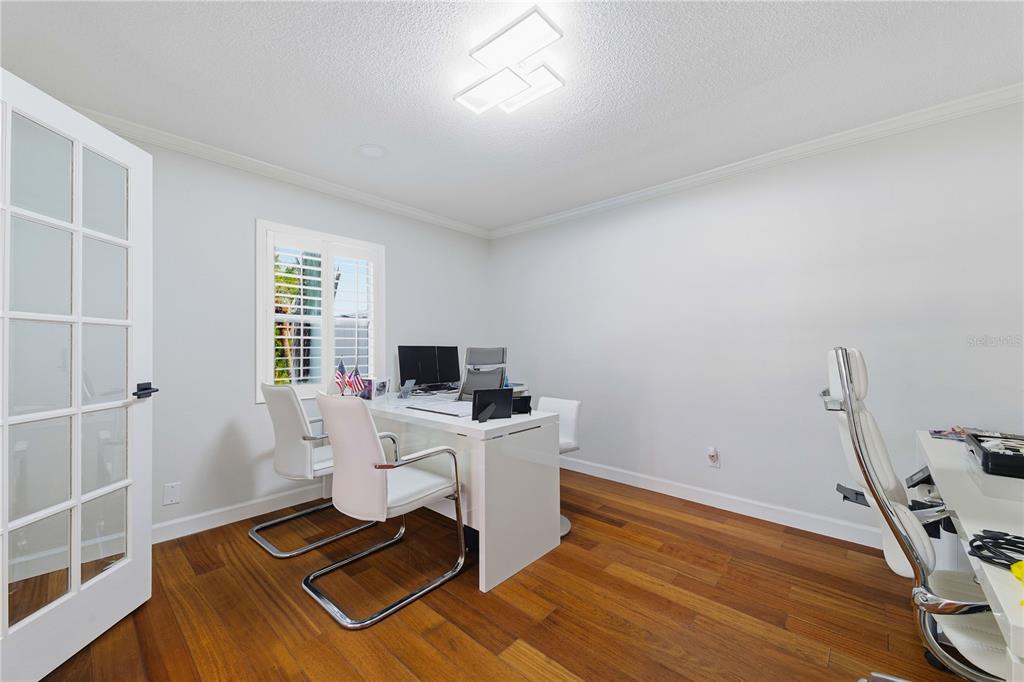 15509 Casey Rd Extension Tampa, FL 33624 - Photo 14 of 65 a view of a workspace with furniture and a window
