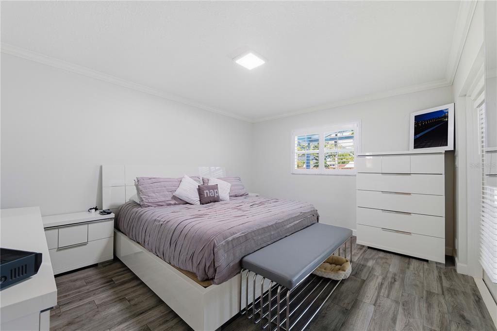 15509 Casey Rd Extension Tampa, FL 33624 - Photo 22 of 65 a bedroom with a bed and a dresser