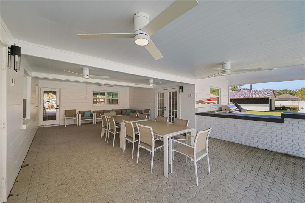 15509 Casey Rd Extension Tampa, FL 33624 - Photo 37 of 65 a kitchen with a table and chairs in it
