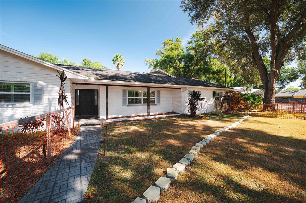 15509 Casey Rd Extension Tampa, FL 33624 - Photo 47 of 65 a view of a house with backyard and sitting area