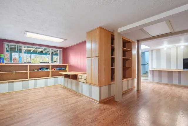 a kitchen with stainless steel appliances a refrigerator and a stove