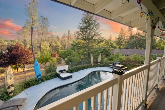 a view of a street from a balcony