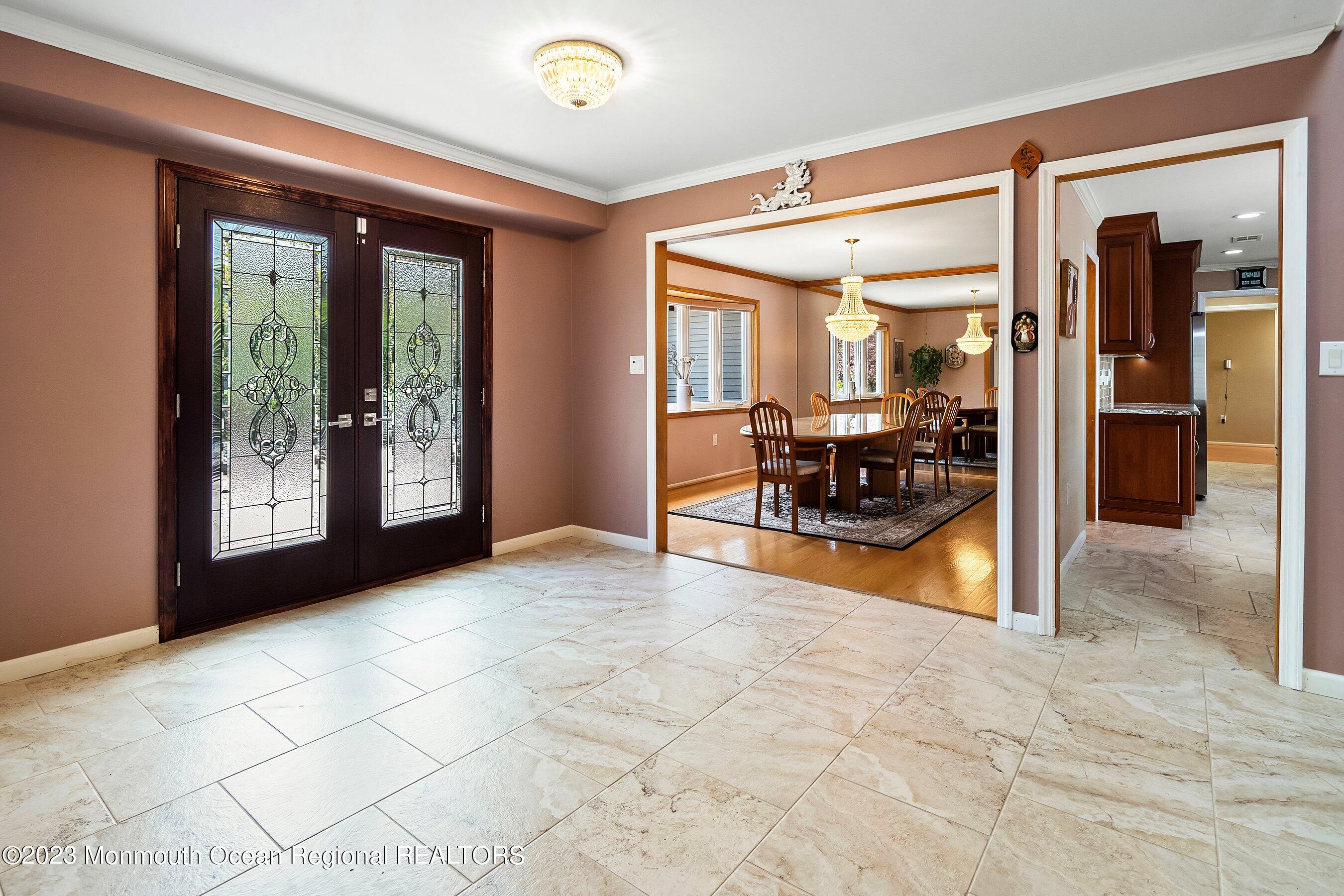 69 Bunker Hill Road Freehold, NJ 07728 - Photo 11 of 39 16-Foyer to Dining and Kitchen