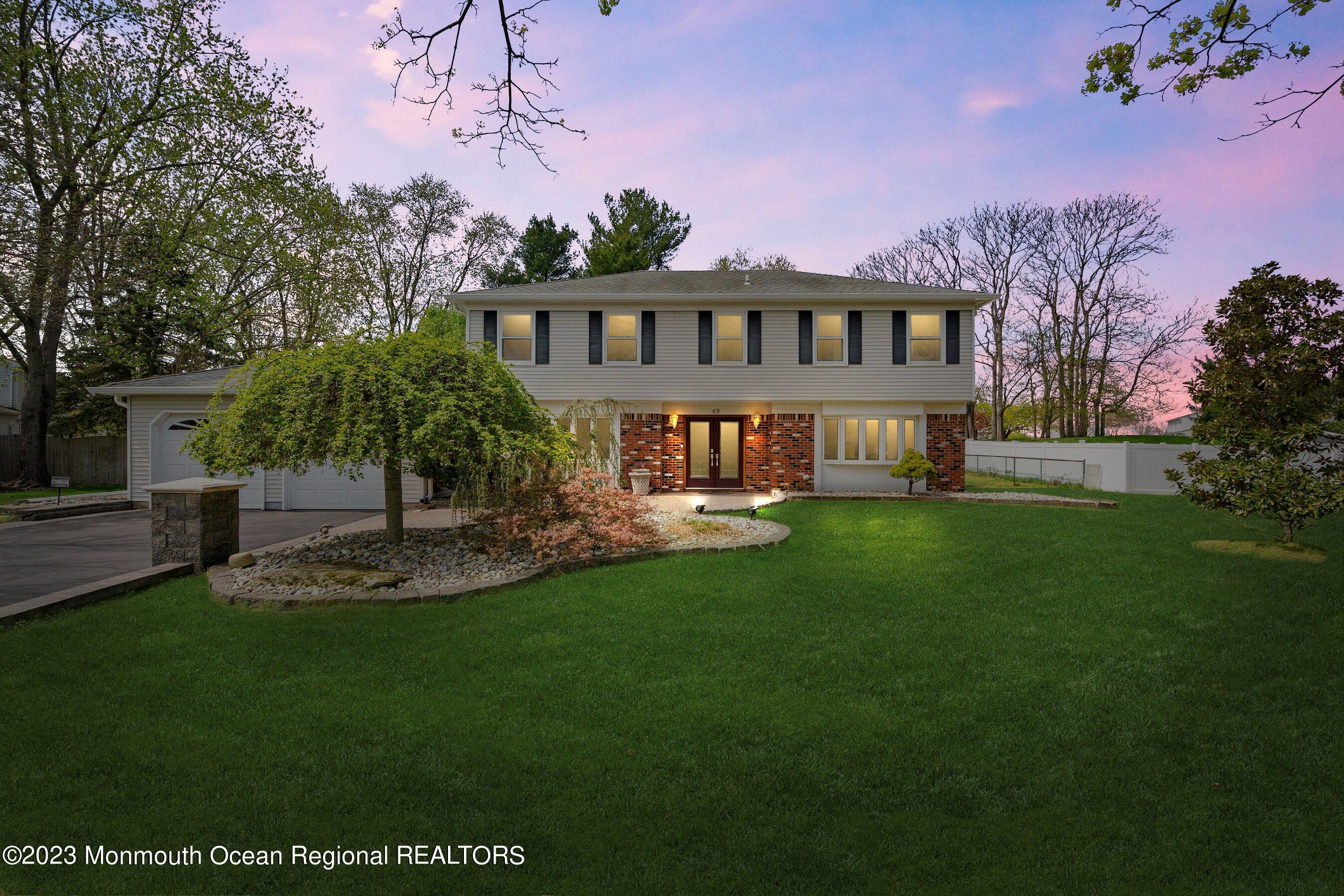 69 Bunker Hill Road Freehold, NJ 07728 - Photo 2 of 39 02-Front GRASS REPLACEMENT w_TWILIGHT