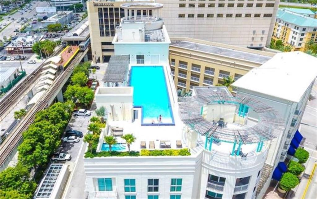 7275 Southwest 90th Way, Unit 504 Miami, FL 33156 - Photo 20 of 24 a aerial view of a house