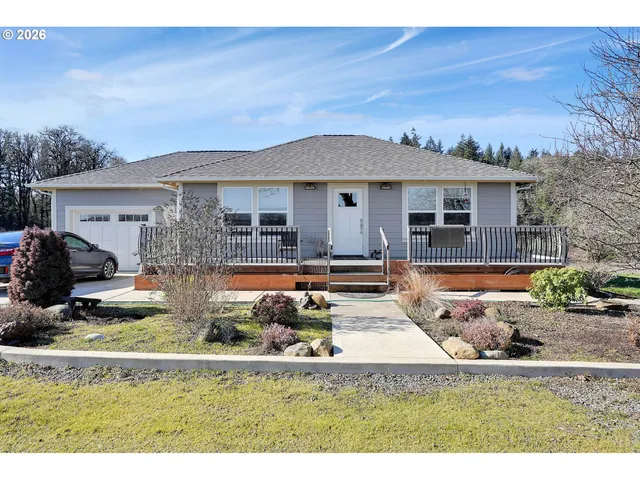 a view of a balcony with an outdoor space
