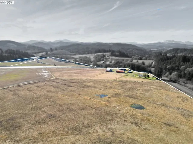 a view of an ocean and a mountain