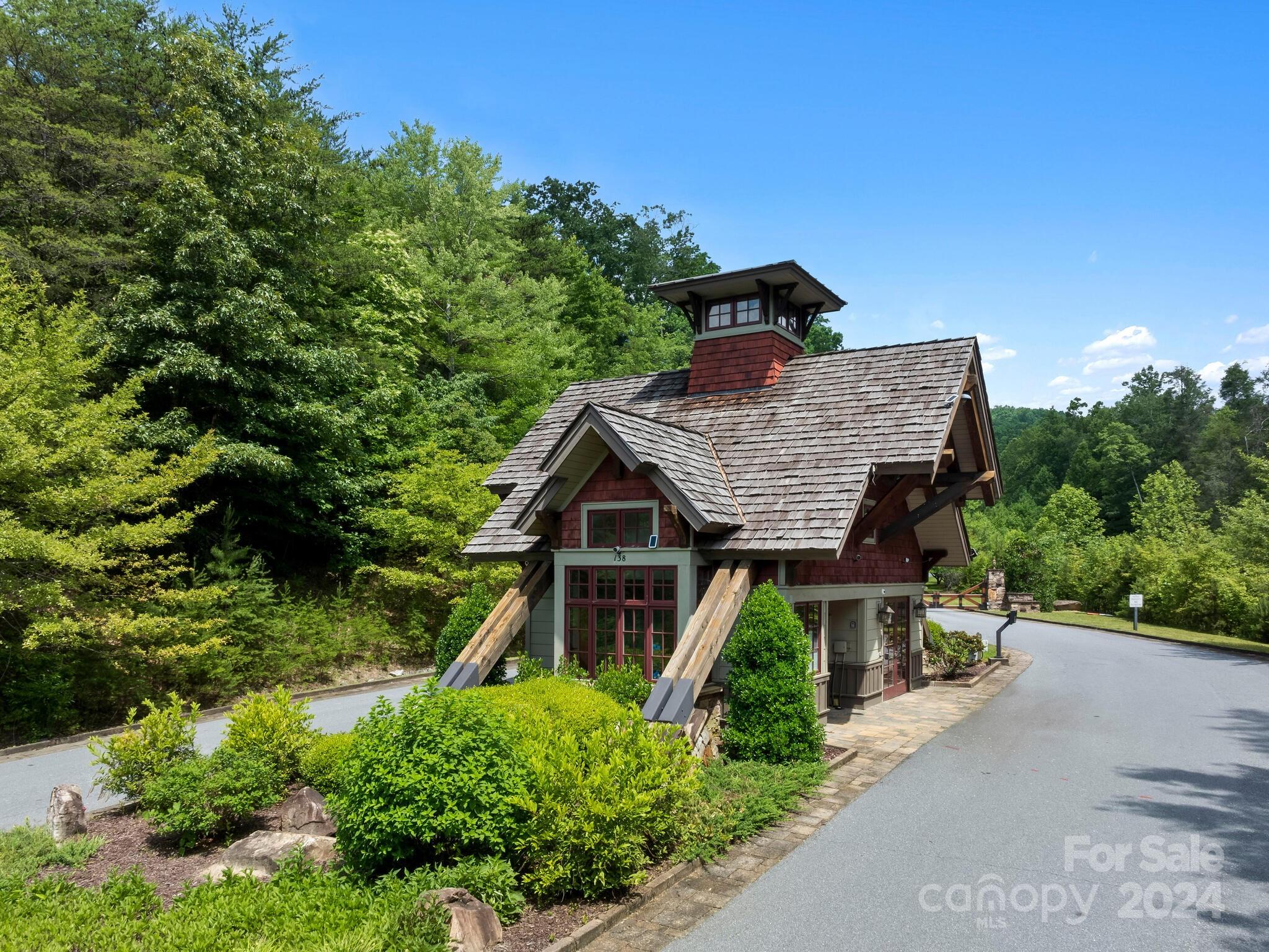 a aerial view of a house with a yard