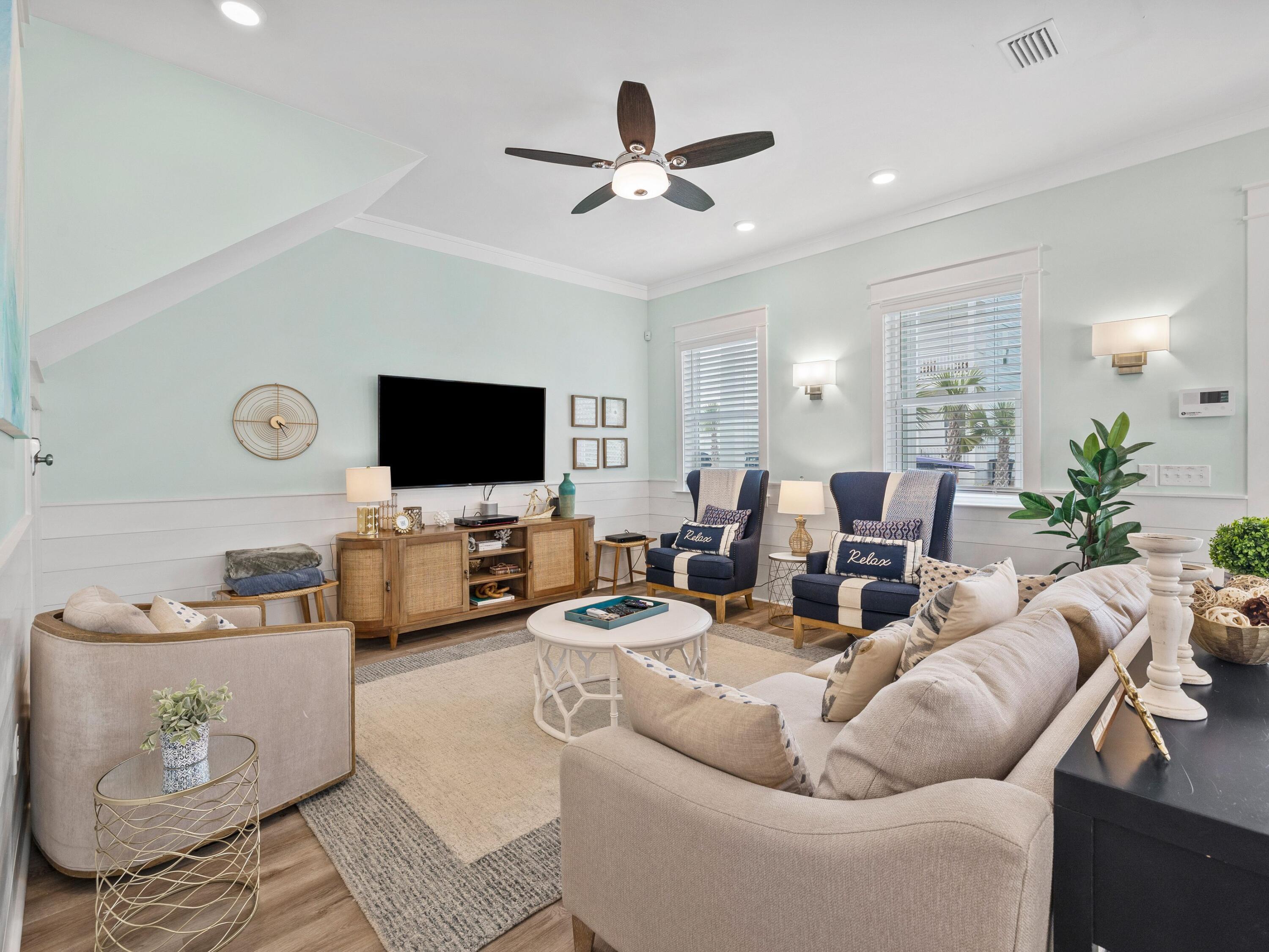 30 Serene Way Santa Rosa Beach, FL 32459 - Photo 11 of 34 a living room with furniture and a flat screen tv