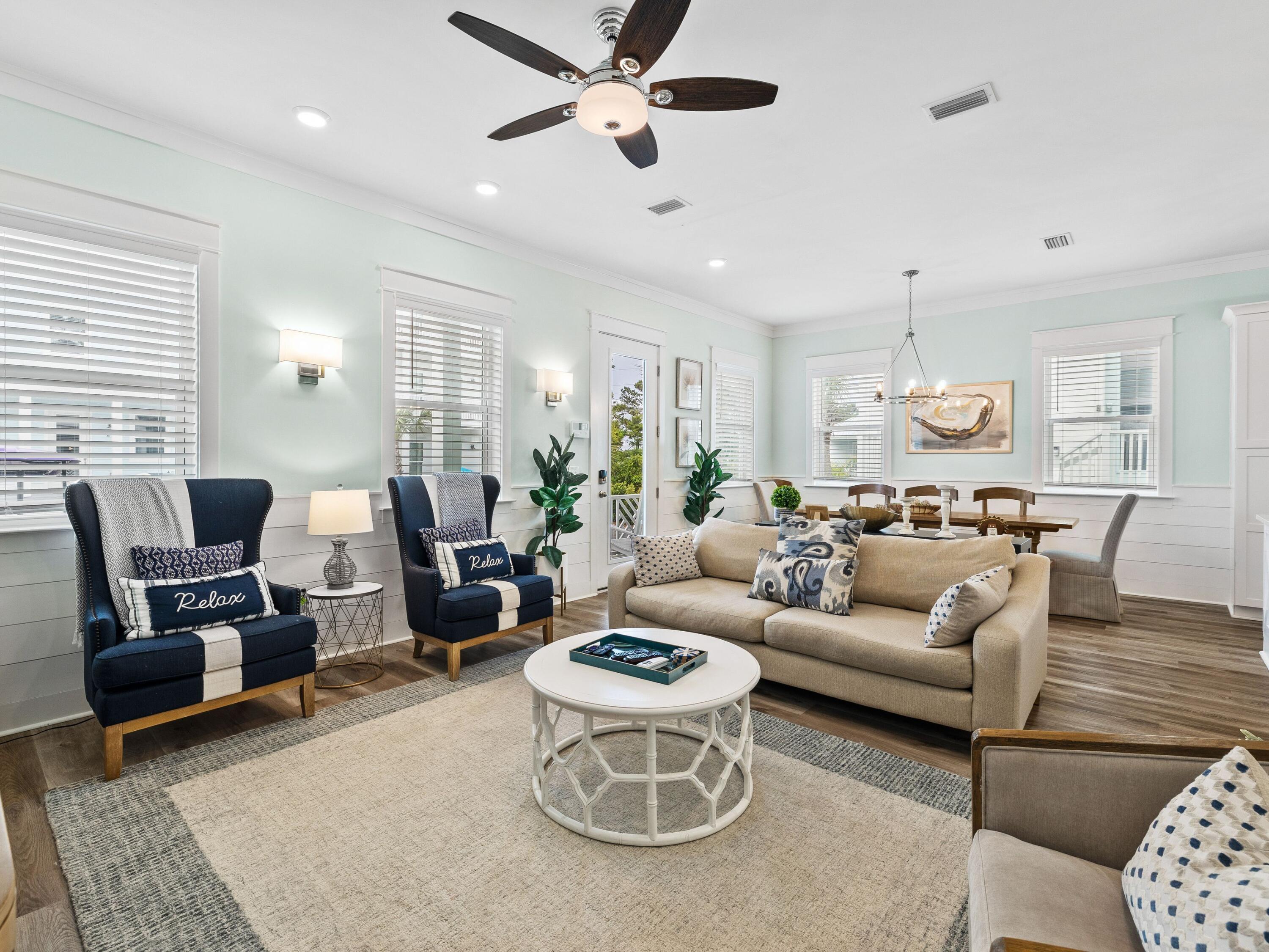 30 Serene Way Santa Rosa Beach, FL 32459 - Photo 12 of 34 a living room with furniture kitchen view and large windows