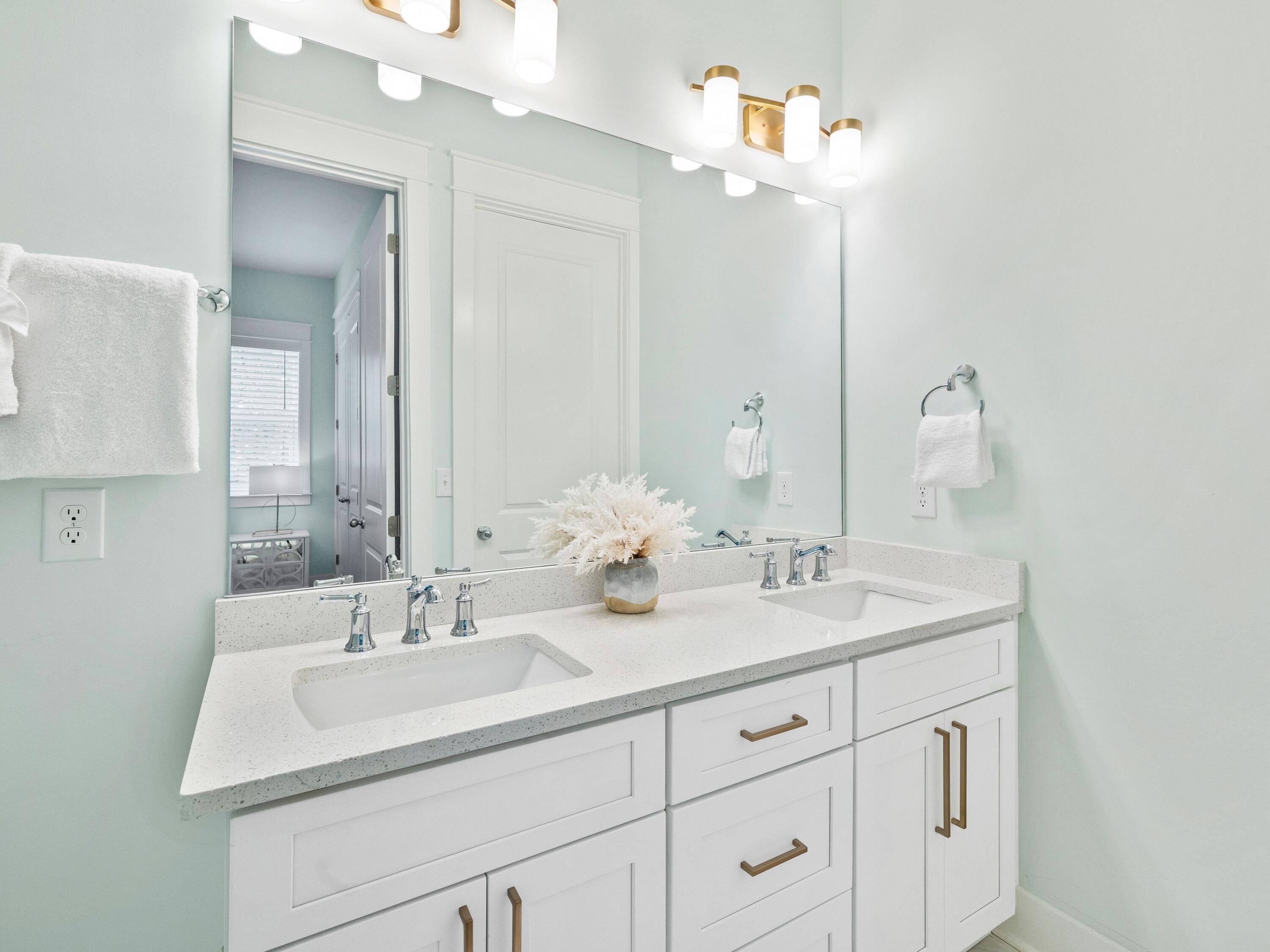 30 Serene Way Santa Rosa Beach, FL 32459 - Photo 14 of 34 a bathroom with double sink and a mirror