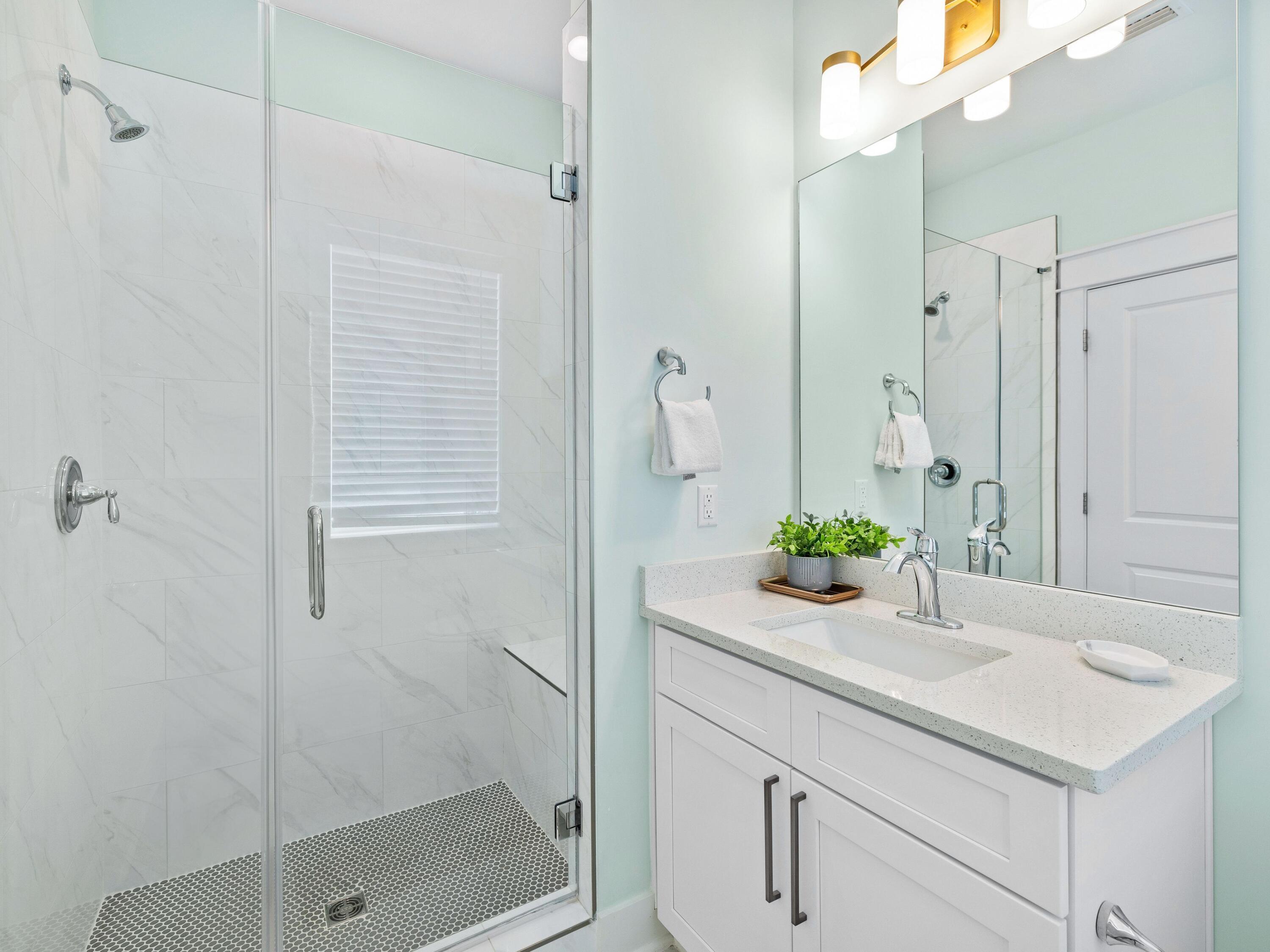 30 Serene Way Santa Rosa Beach, FL 32459 - Photo 23 of 34 a bathroom with a sink and a mirror