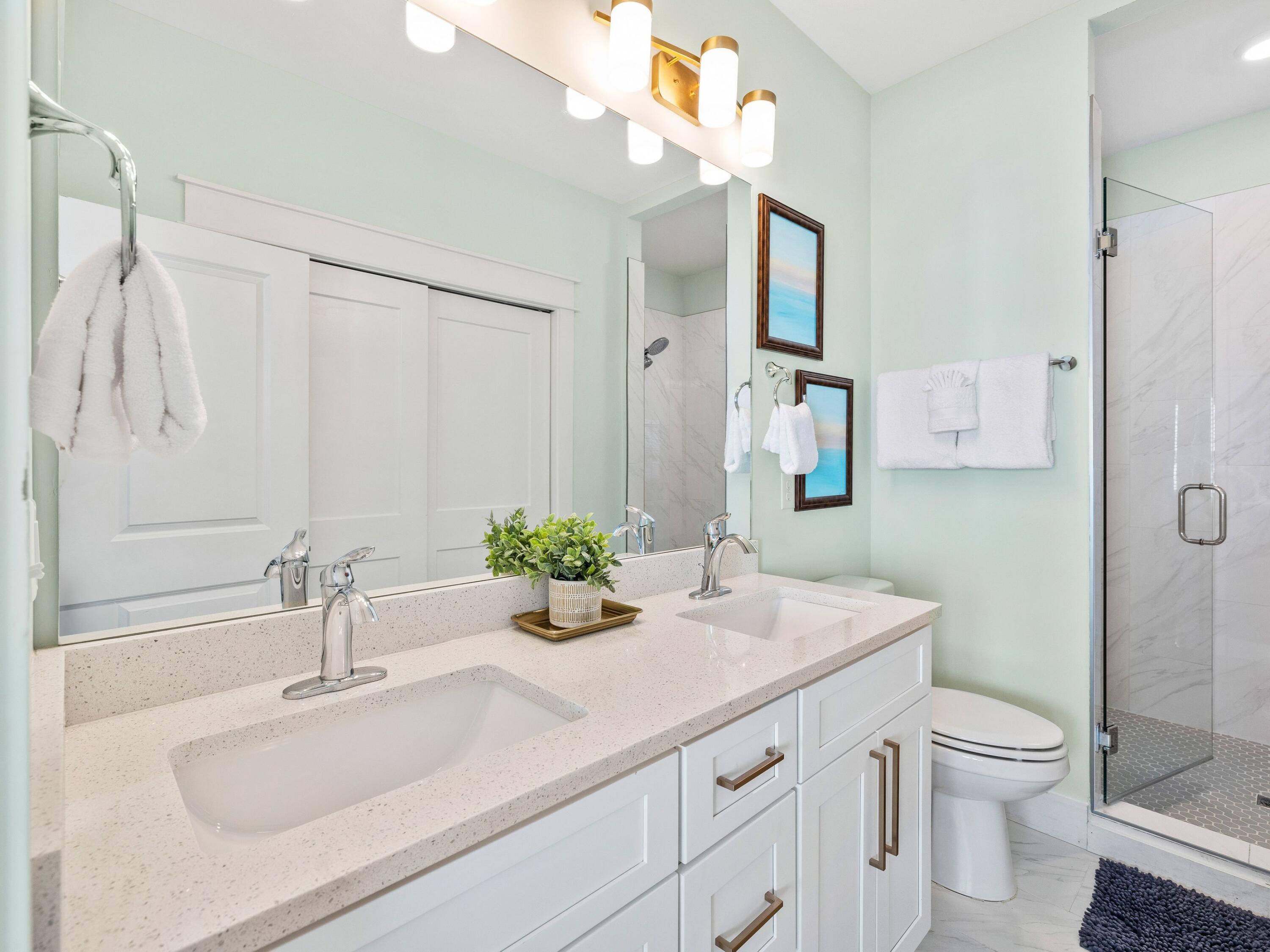 30 Serene Way Santa Rosa Beach, FL 32459 - Photo 25 of 34 a bathroom with a sink a toilet and shower