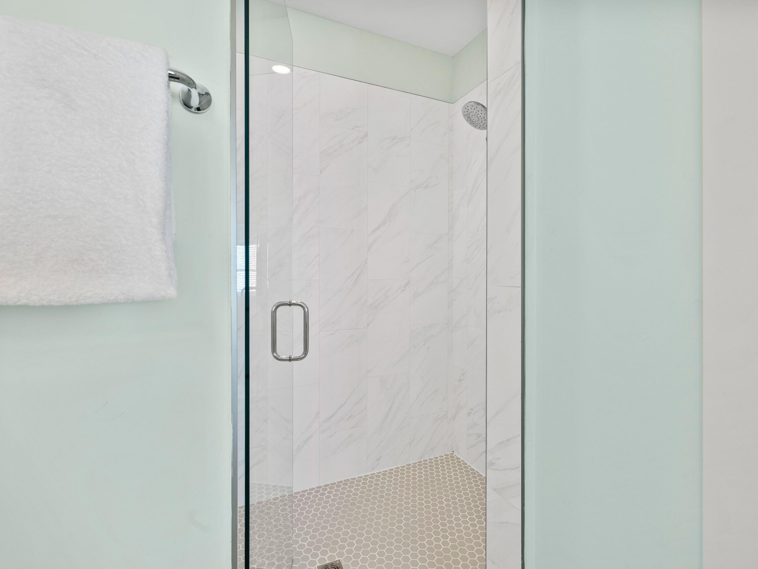 30 Serene Way Santa Rosa Beach, FL 32459 - Photo 26 of 34 a bathroom with a glass shower door