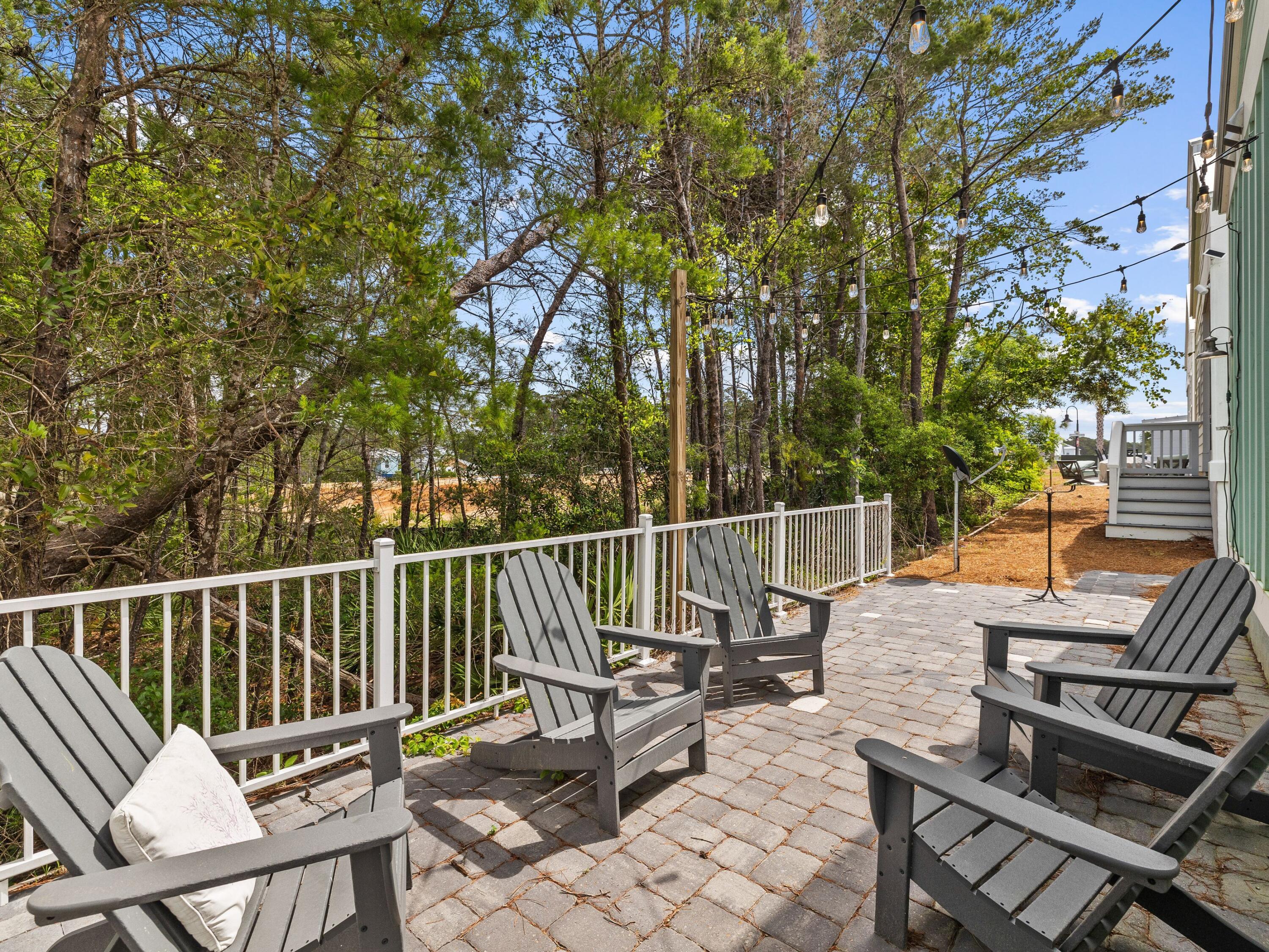 30 Serene Way Santa Rosa Beach, FL 32459 - Photo 28 of 34 a view of a chairs and table in the balcony