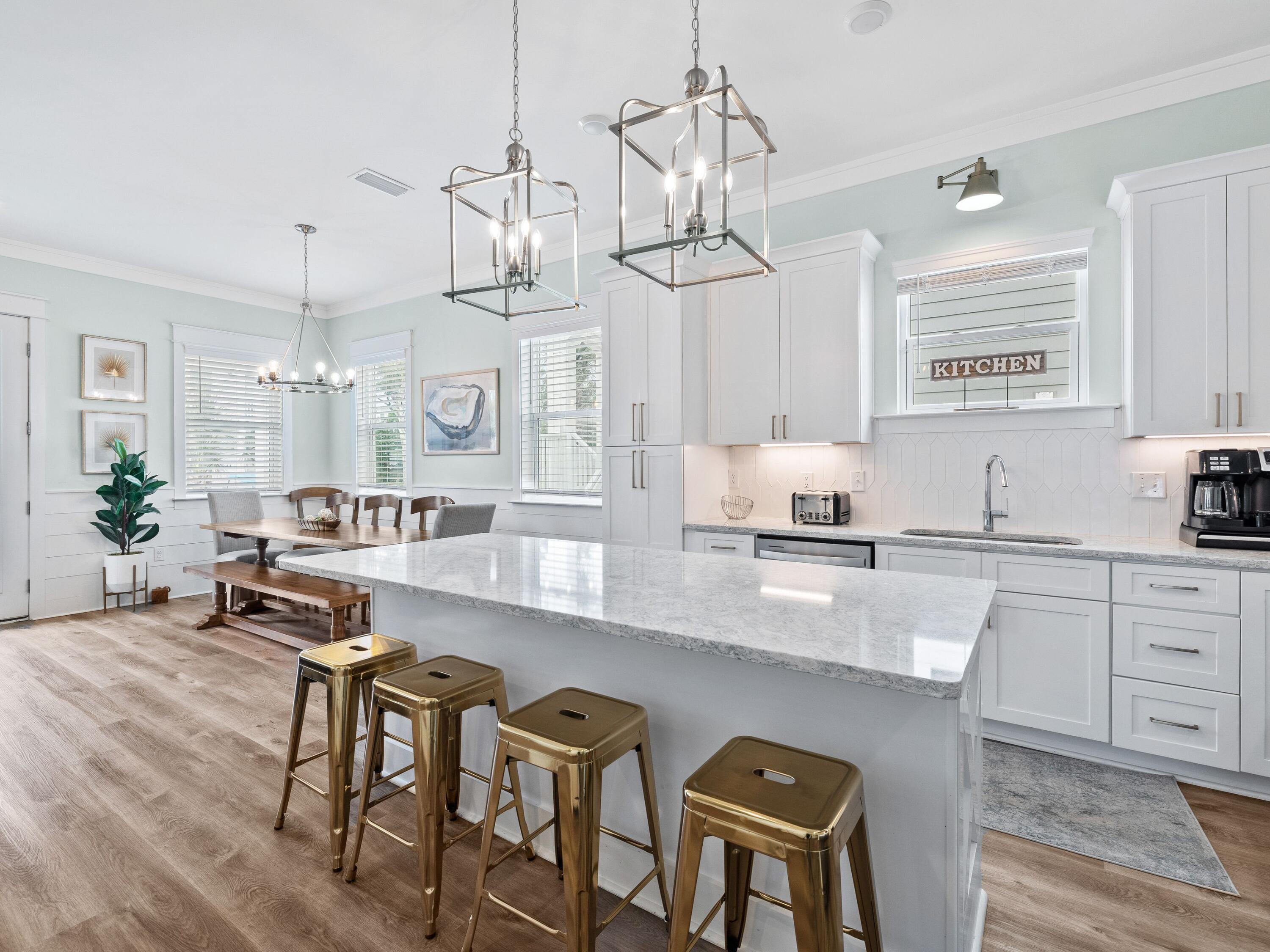30 Serene Way Santa Rosa Beach, FL 32459 - Photo 4 of 34 a large kitchen with a table and chairs in it
