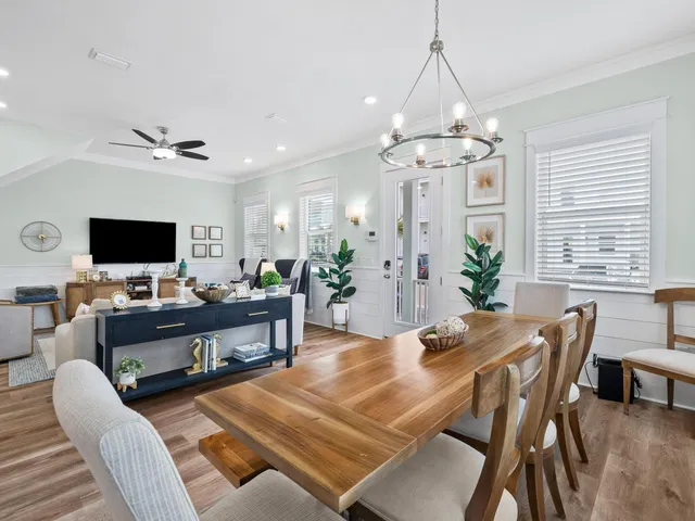 a view of a livingroom with furniture and a chandelier
