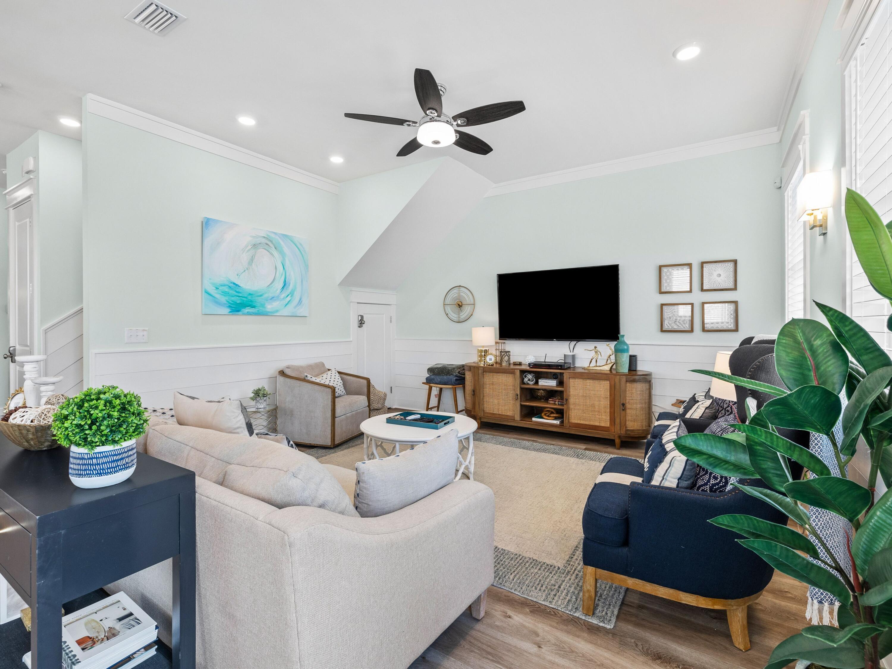 30 Serene Way Santa Rosa Beach, FL 32459 - Photo 10 of 34 a living room with furniture and a flat screen tv