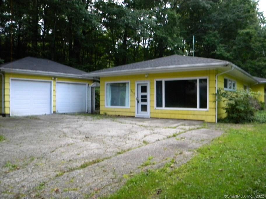 a house with trees in front of it