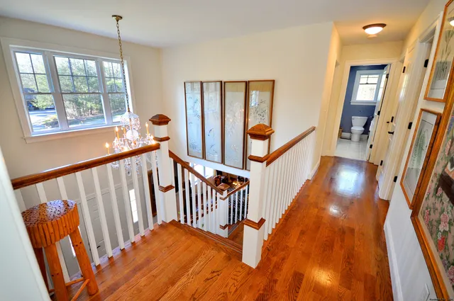 a view of staircase with rug floor